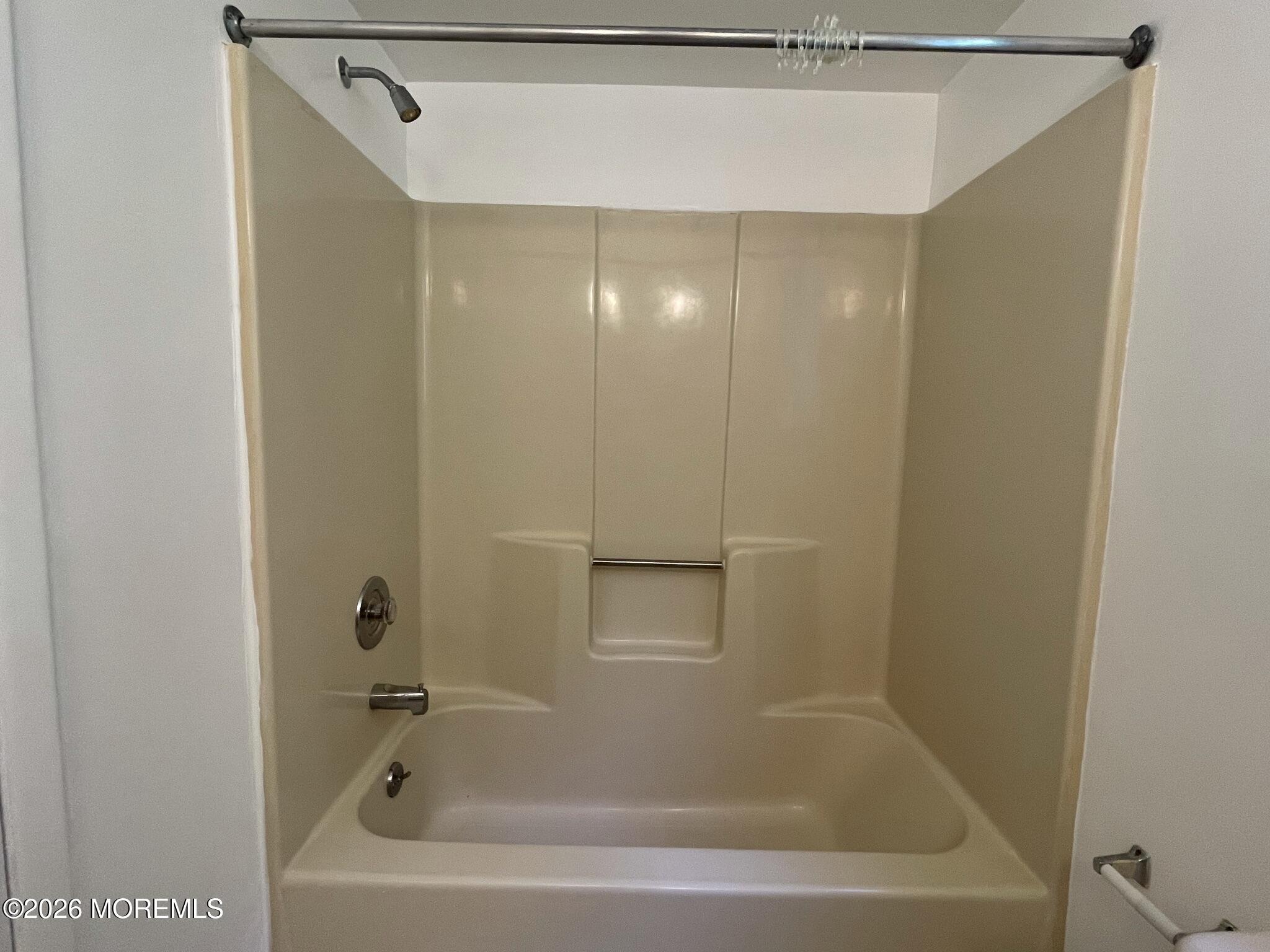 19 Clavendon Court Middletown, NJ 07748 - Photo 20 of 21 a bathroom with a bathtub