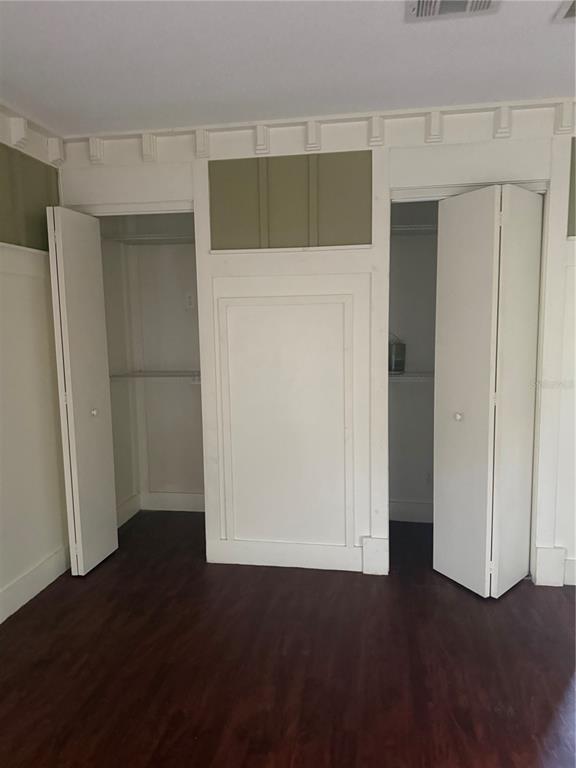 8330 Northeast 100th Avenue Bronson, FL 32621 - Photo 7 of 17 a view of hallway with wooden floor