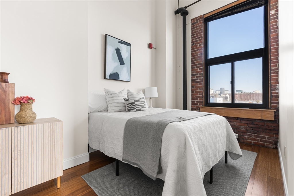 320 West 2nd Street, Unit 502 Boston, MA 02127 - Photo 11 of 21 a bedroom with a bed and a window