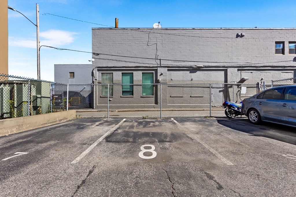 320 West 2nd Street, Unit 502 Boston, MA 02127 - Photo 17 of 21 a car parked in front of a house