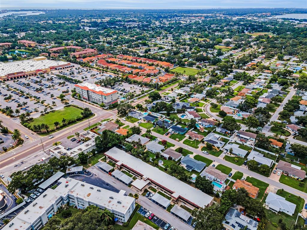 9945 47th Avenue North, Unit 210 St. Petersburg, FL 33708 - Photo 11 of 78 an aerial view of a city with lots of residential buildings