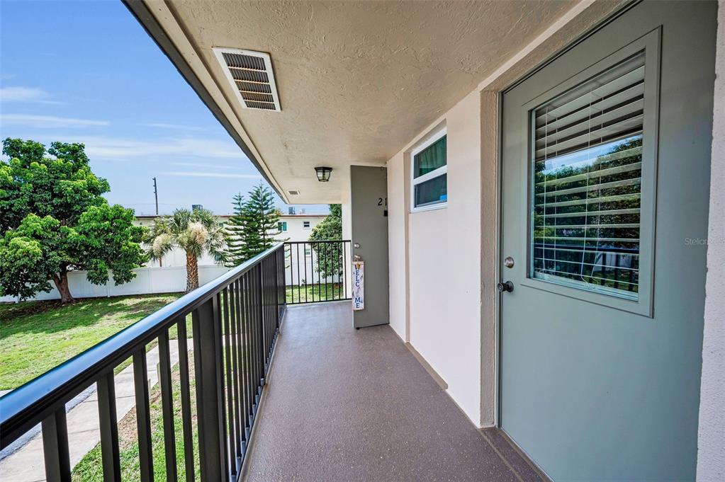 9945 47th Avenue North, Unit 210 St. Petersburg, FL 33708 - Photo 16 of 78 a view of a balcony