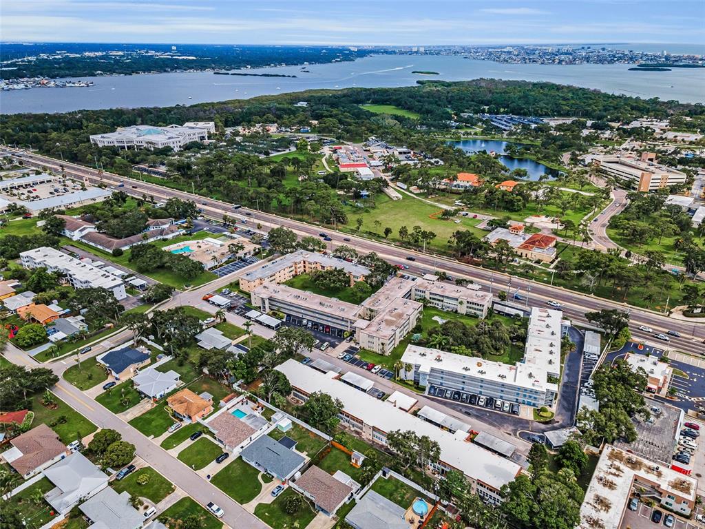 9945 47th Avenue North, Unit 210 St. Petersburg, FL 33708 - Photo 48 of 78 an aerial view of a city with lots of residential buildings