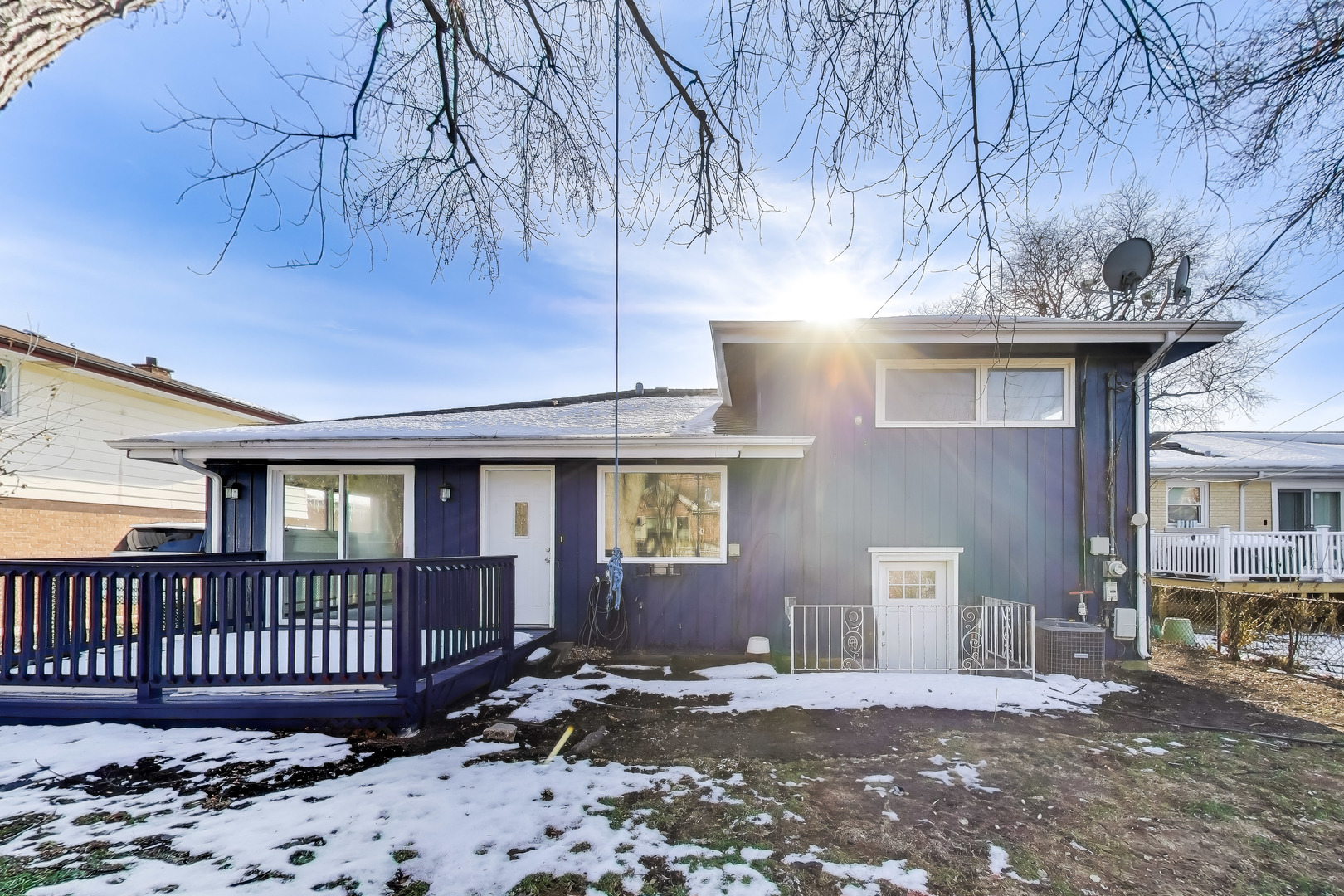 1006 Devon Avenue Park Ridge, IL 60068 - Photo 31 of 38 a view of a house with a wooden fence