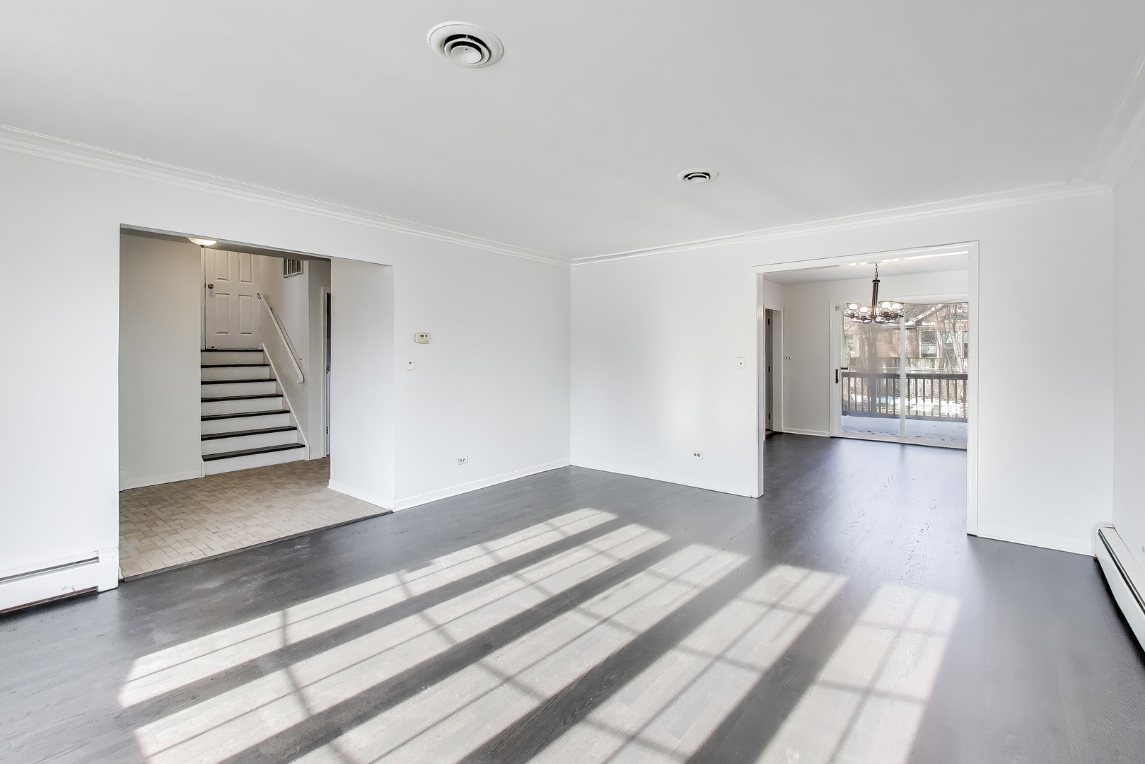 1006 Devon Avenue Park Ridge, IL 60068 - Photo 8 of 38 a view of a livingroom with wooden floor