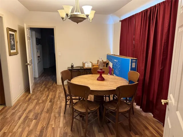 a workspace with furniture and wooden floor