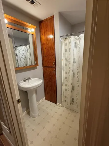 a bathroom with a toilet and a sink