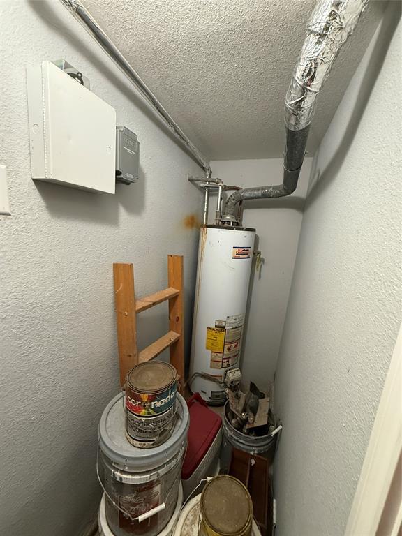 609 East Henry Street Hamilton, TX 76531 - Photo 29 of 40 a living room with furniture and a fireplace