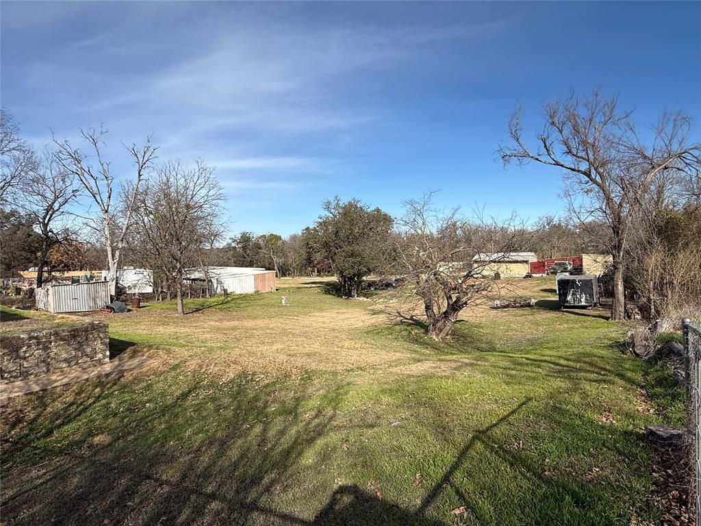 609 East Henry Street Hamilton, TX 76531 - Photo 30 of 40 a view of yard with tree