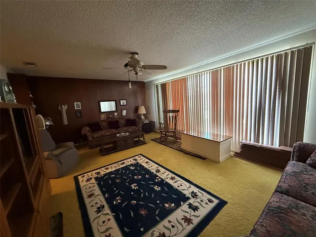 a view of a living room and furniture