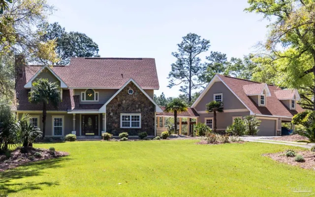 a front view of a house with swimming pool