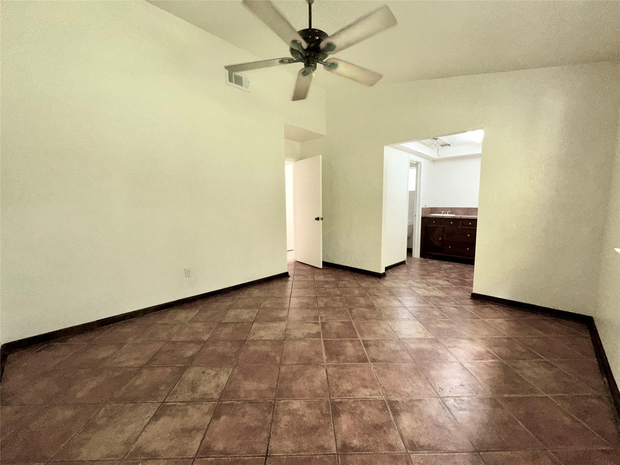 8511 Little River Road Houston, TX 77064 - Photo 13 of 19 a view of a livingroom with a ceiling fan and window