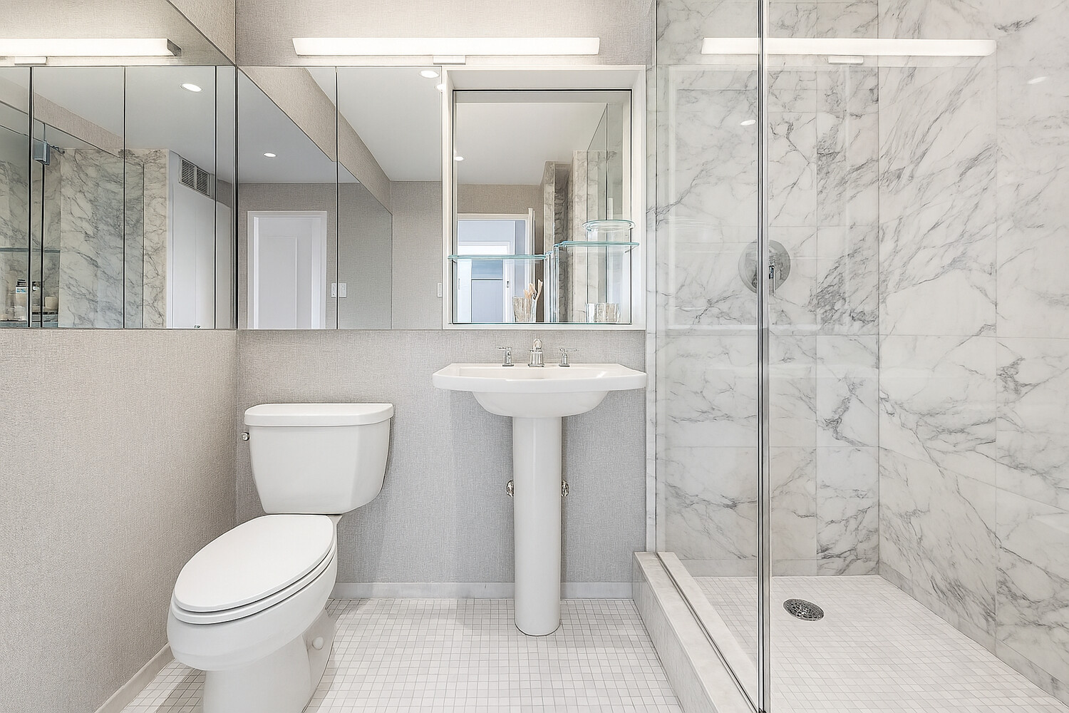 2 Charlton Street, Unit PH16F Manhattan, NY 10014 - Photo 16 of 20 a bathroom with a sink a toilet and shower