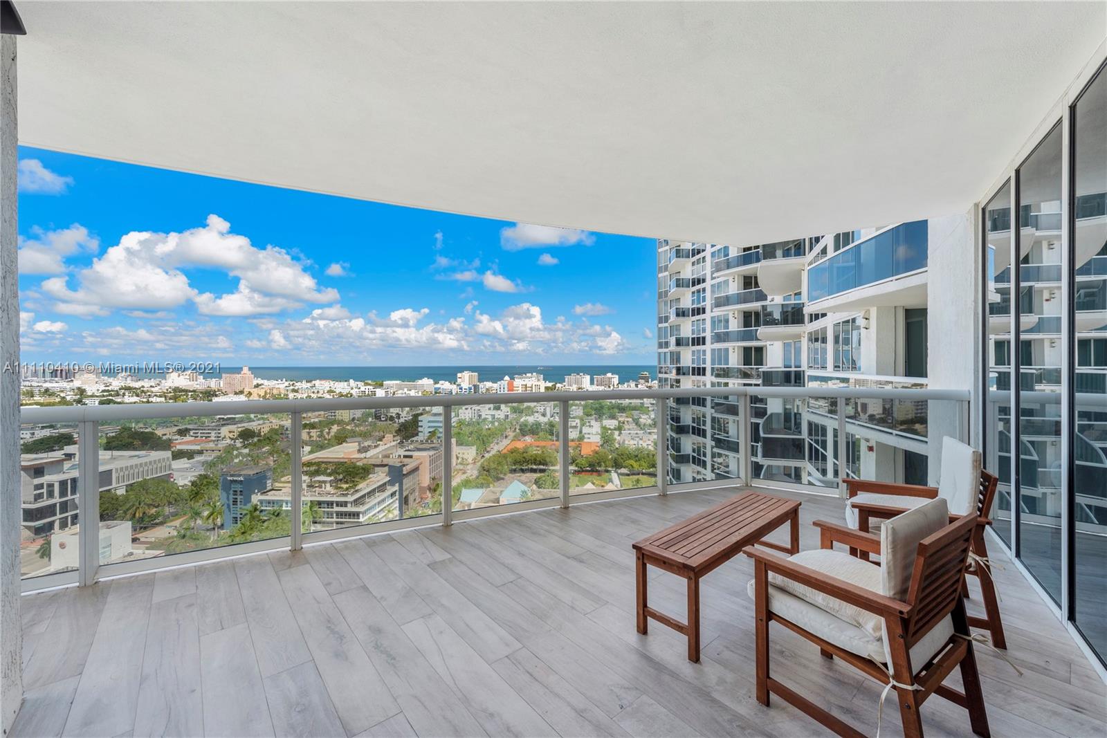 400 Alton Road, Unit 2003 Miami Beach, FL 33139 - Photo 28 of 38 a view of a balcony with lake view and mountain view