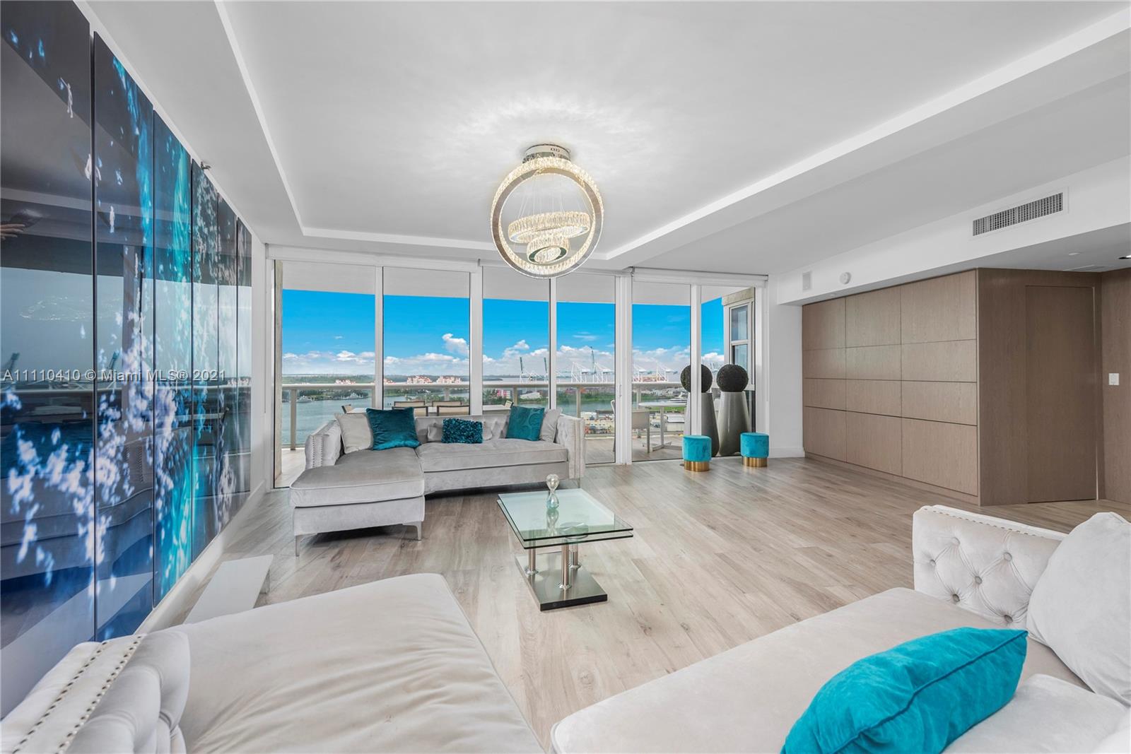 400 Alton Road, Unit 2003 Miami Beach, FL 33139 - Photo 5 of 38 a living room with furniture and a large window