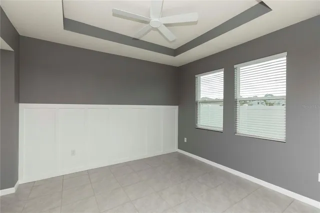 a large kitchen with stainless steel appliances granite countertop a stove and a sink