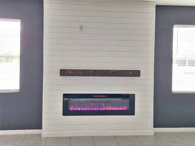 a spacious bathroom with a bathtub and a sink