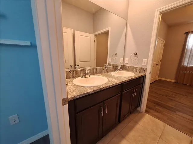 a view of house with yard