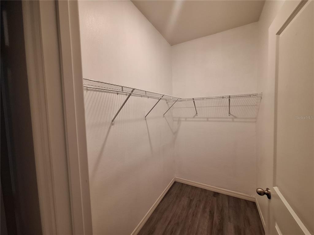 13483 Golden Lime Ave Spring Hill Spring Hill, FL 34609 - Photo 68 of 92 a view of a room with racks on the wall