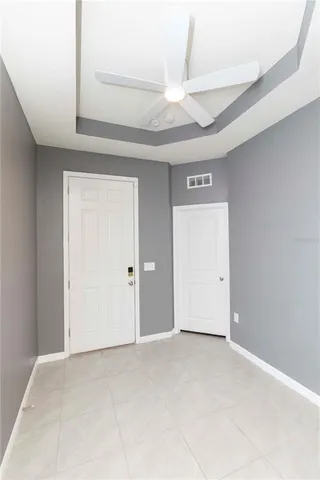 a kitchen with granite countertop wood cabinets and stainless steel appliances