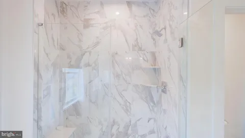 a bathroom with a shower curtain