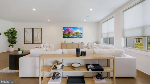 a living room with furniture and window