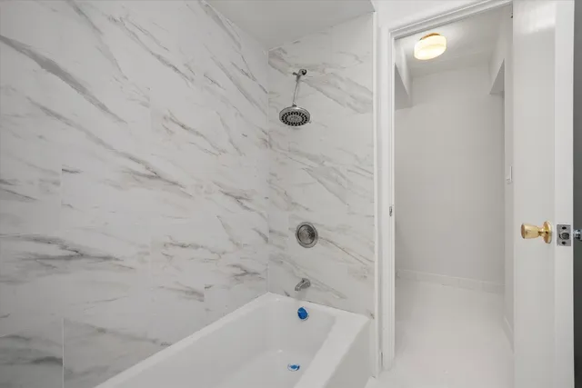 a bathroom with a bathtub