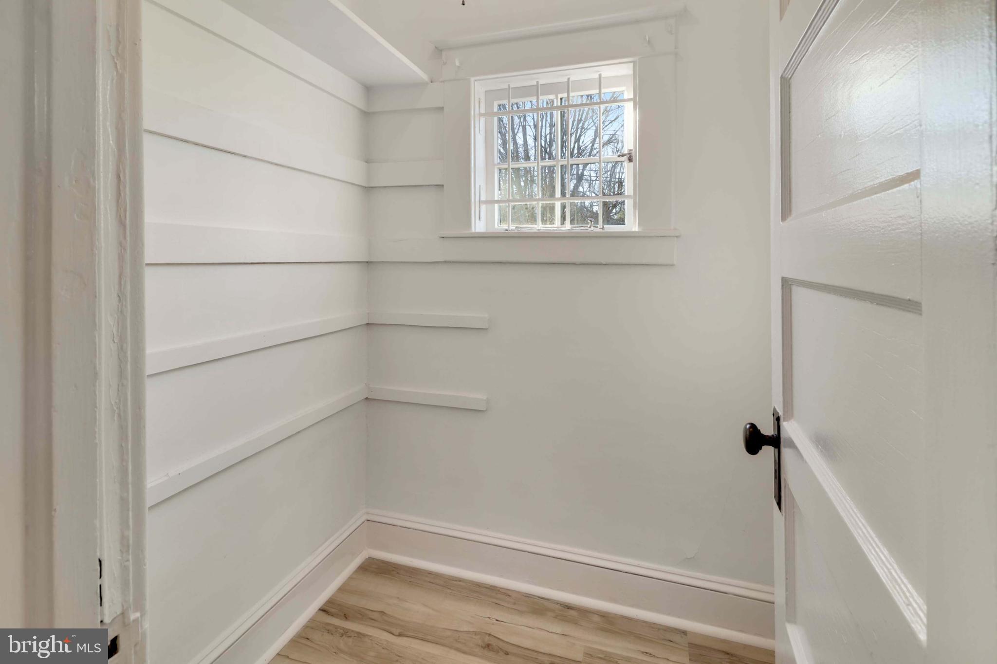 5314 Brabant Road Baltimore, MD 21229 - Photo 11 of 22 a view of a small space with racks on the wall