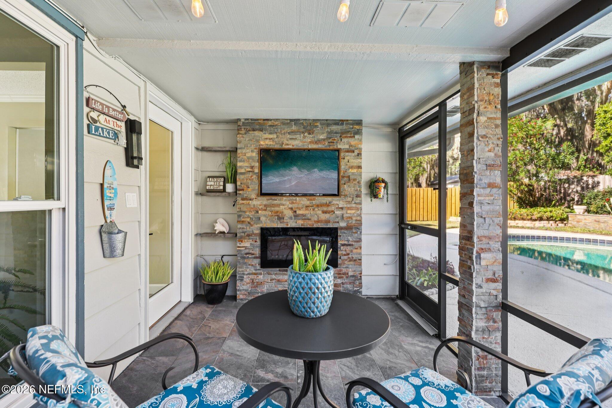 3585 Lawrence Road Orange Park, FL 32073 - Photo 47 of 73 Lanai with Fireplace