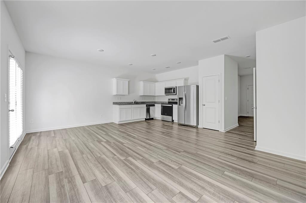 3568 Eagle Court Atlanta, GA 30331 - Photo 5 of 19 a view of kitchen and wooden floor