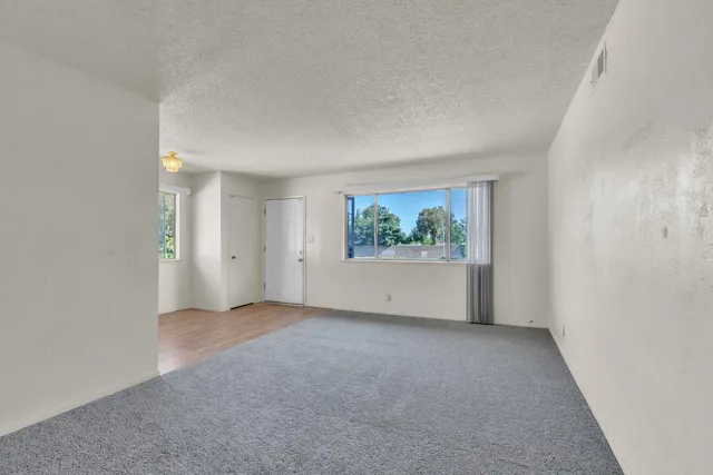 an empty room with windows