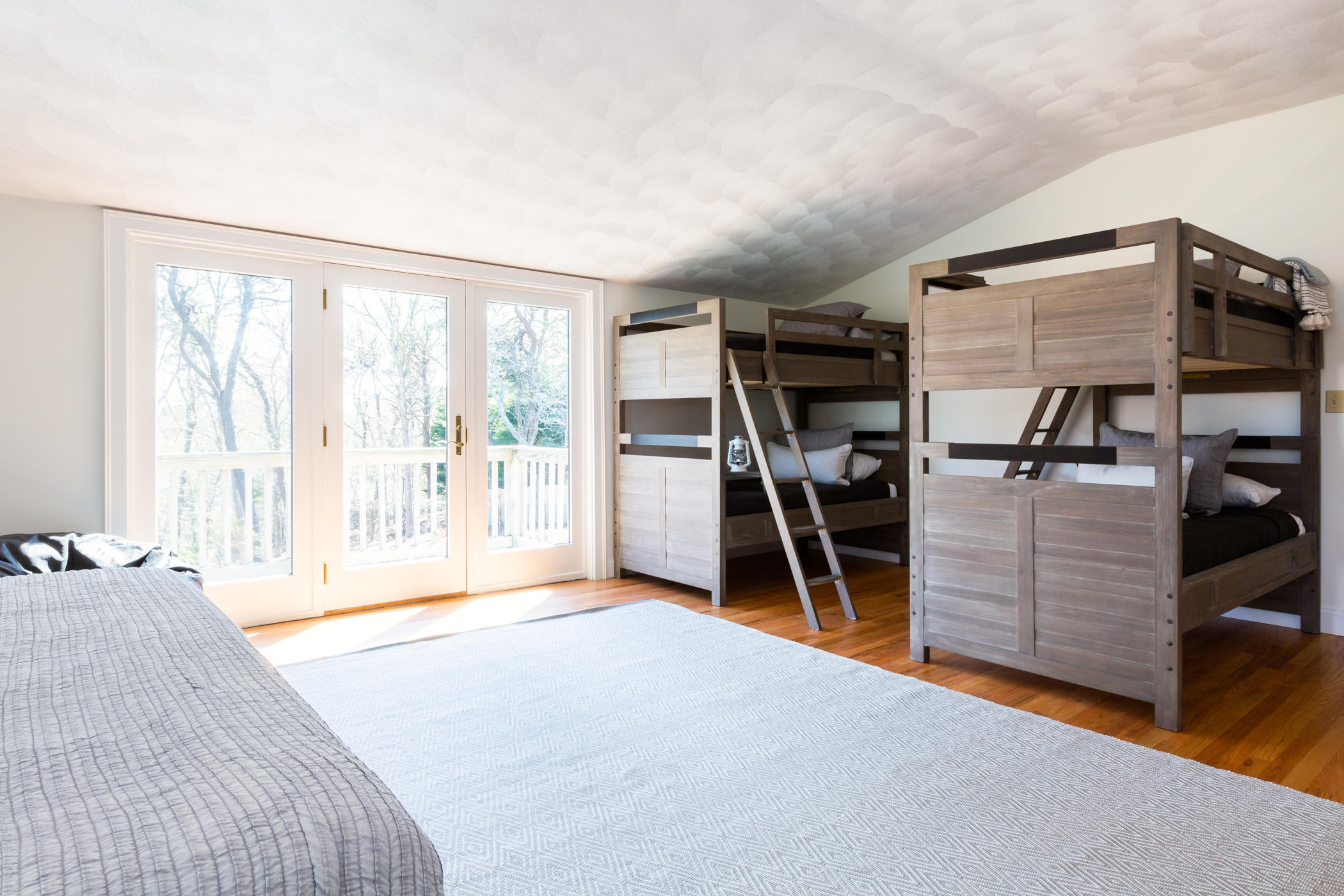 65 Harbor Hill Road Chatham, MA 02633 - Photo 54 of 60 a bedroom with furniture and a large window