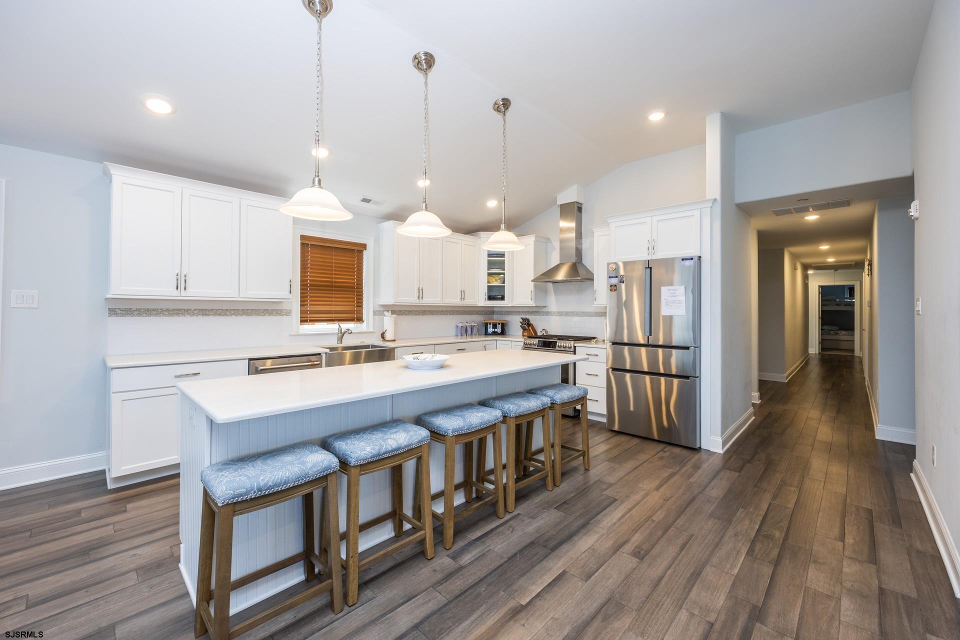 910 Ocean Avenue, Unit C Ocean City, NJ 08226 - Photo 6 of 36 a large kitchen with lots of counter space a sink appliances and cabinets