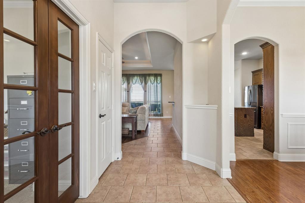 600 Lonesome Trail Haslet, TX 76052 - Photo 11 of 36 a view of a hallway with closet and living room