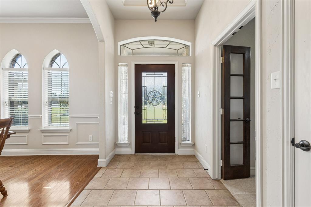 600 Lonesome Trail Haslet, TX 76052 - Photo 12 of 36 a view of a hallway with windows