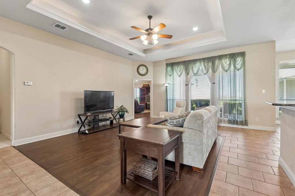 600 Lonesome Trail Haslet, TX 76052 - Photo 13 of 36 a view of a livingroom with furniture and a ceiling fan