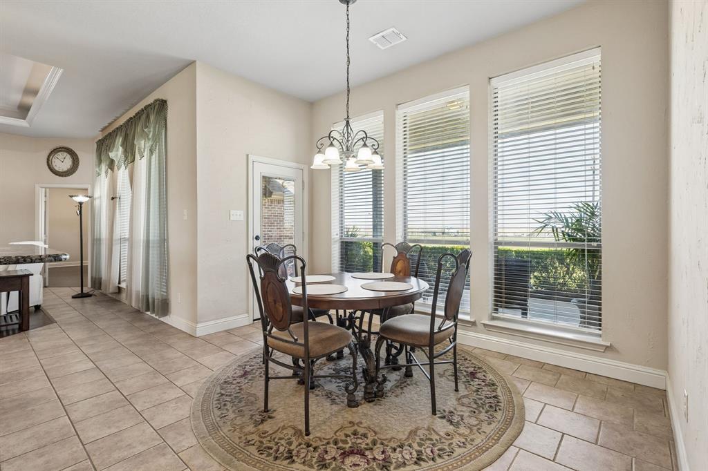 600 Lonesome Trail Haslet, TX 76052 - Photo 16 of 36 a view of a dining room with furniture and window