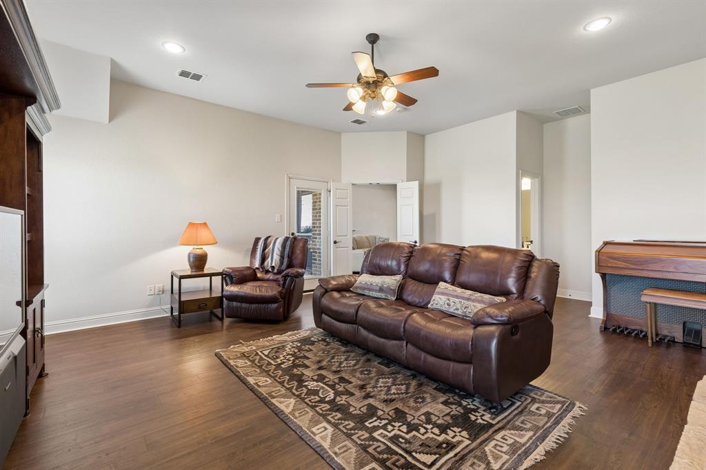 600 Lonesome Trail Haslet, TX 76052 - Photo 24 of 36 a living room with furniture and wooden floor