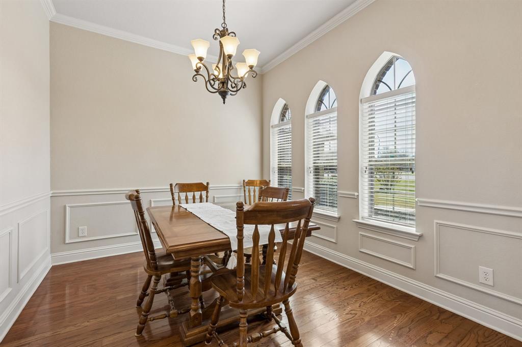 600 Lonesome Trail Haslet, TX 76052 - Photo 25 of 36 a view of a dining room with furniture window and wooden floor