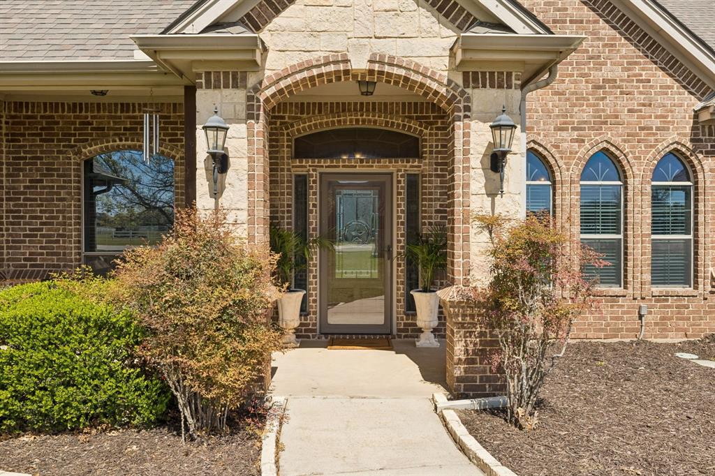 600 Lonesome Trail Haslet, TX 76052 - Photo 4 of 36 a front view of a house