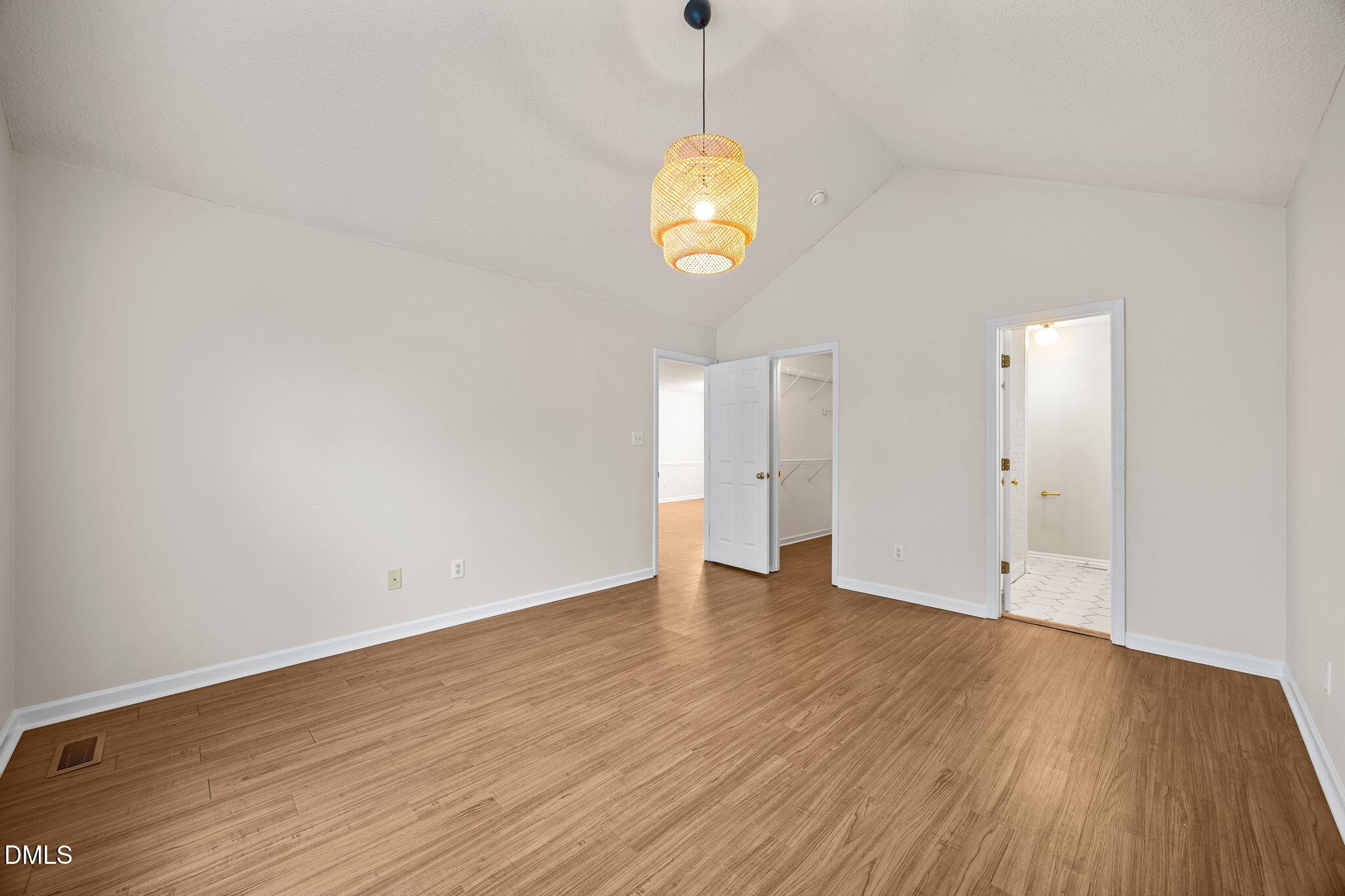 71 Rosa Circle Willow Spring, NC 27592 - Photo 14 of 31 a view of an empty room with wooden floor and window