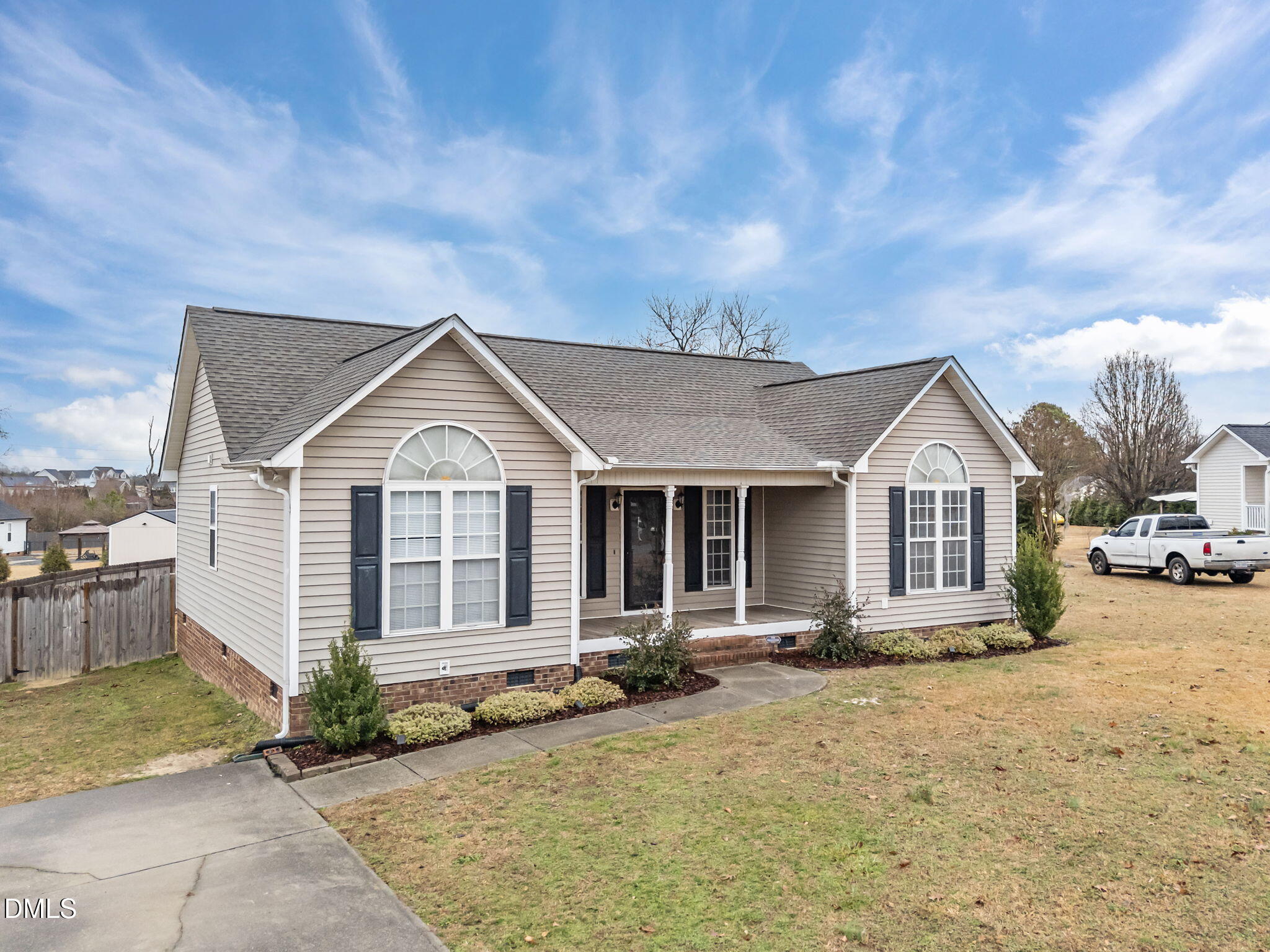 71 Rosa Circle Willow Spring, NC 27592 - Photo 2 of 31 a view of a house with a yard and large tree