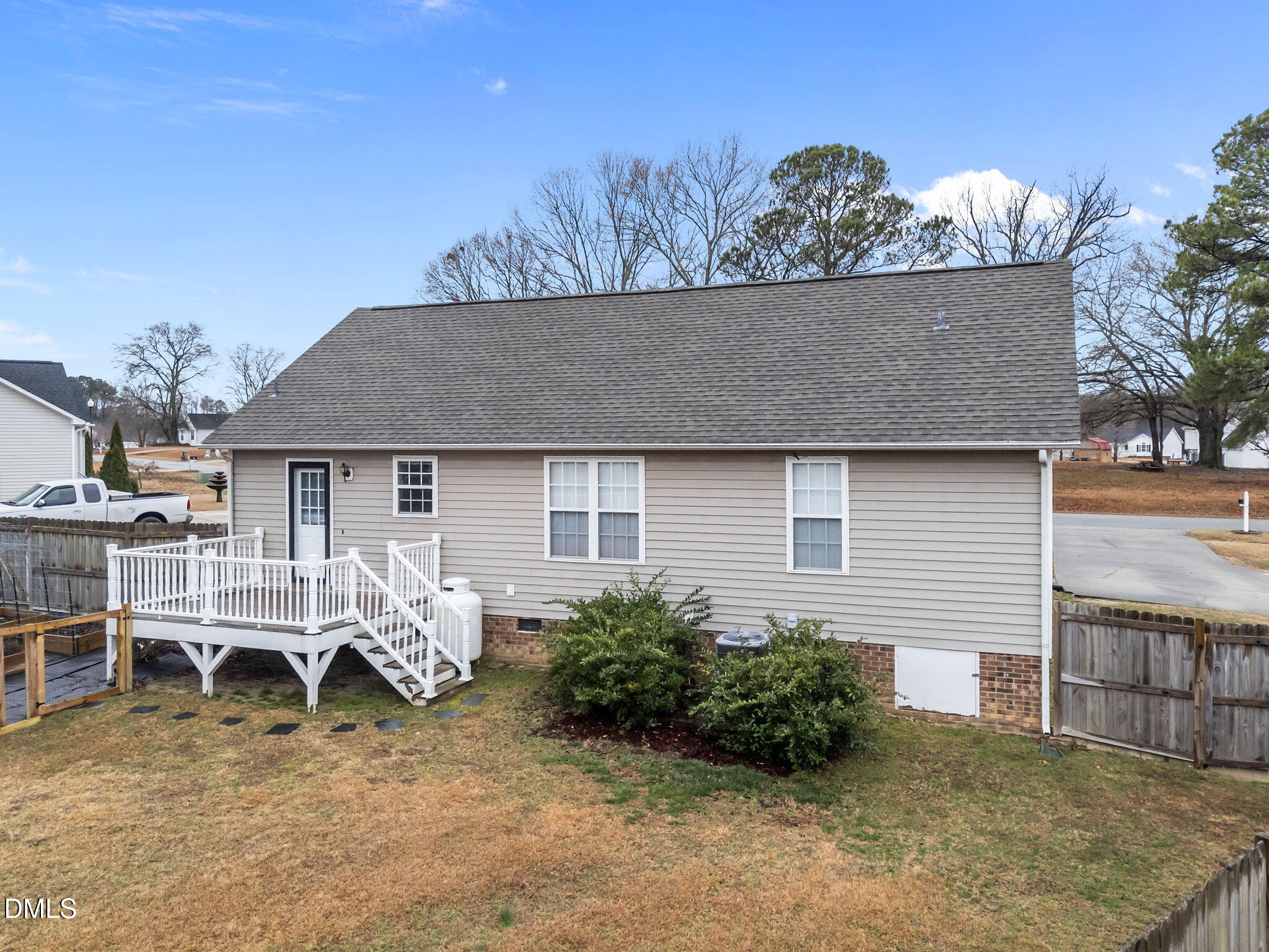 71 Rosa Circle Willow Spring, NC 27592 - Photo 21 of 31 a view of a house with a yard and garage