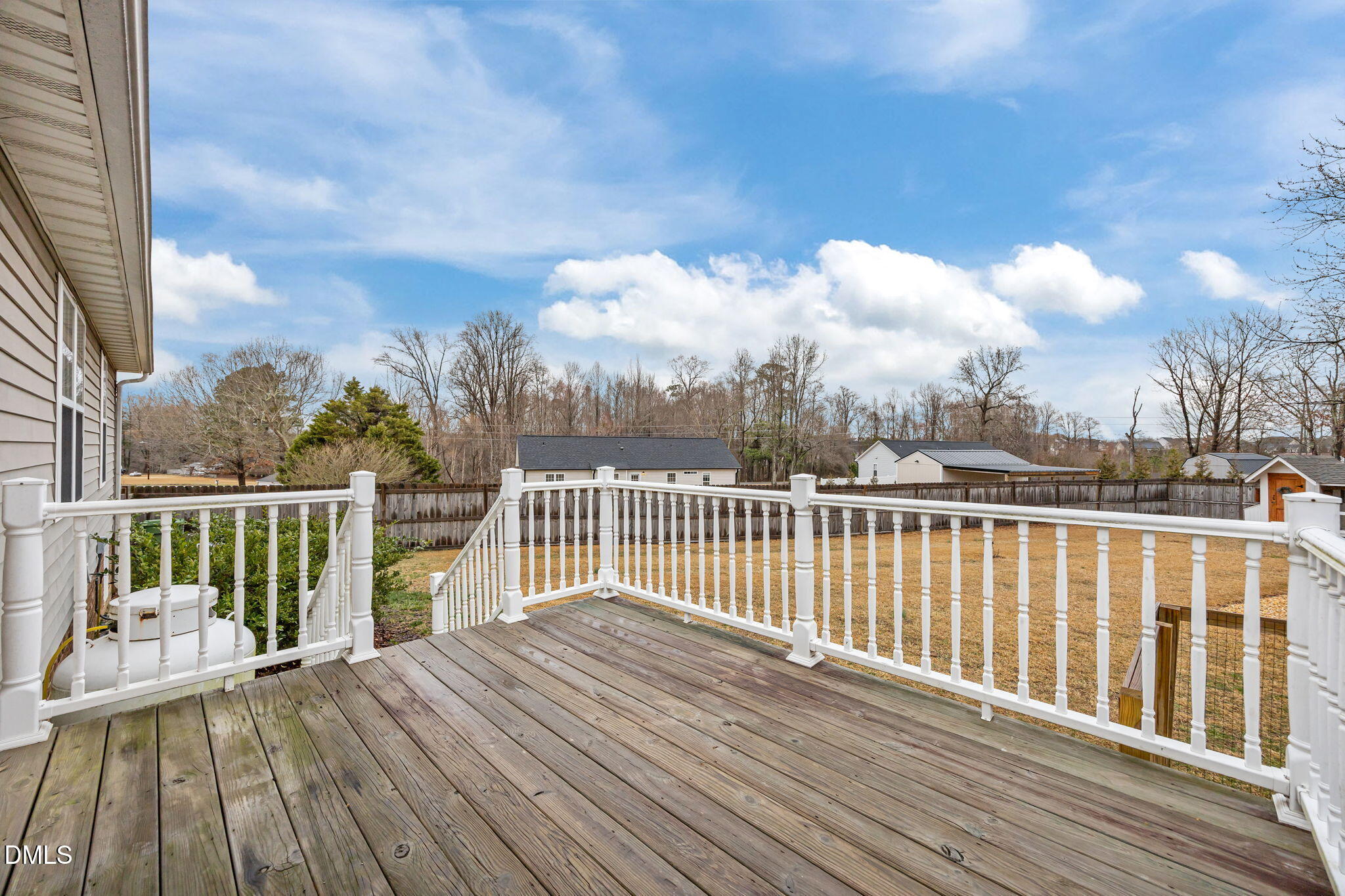 71 Rosa Circle Willow Spring, NC 27592 - Photo 22 of 31 a view of balcony with wooden floor