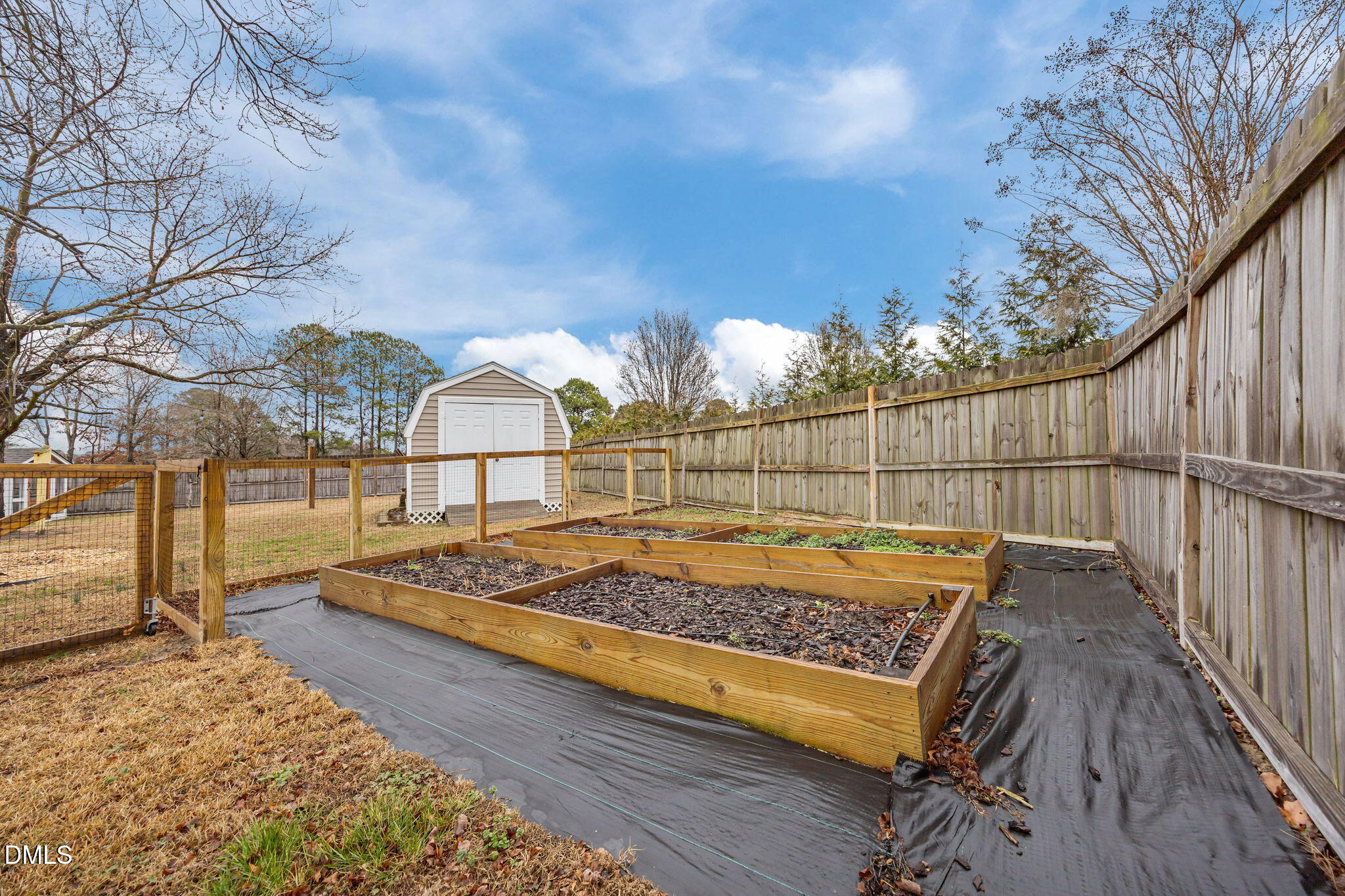 71 Rosa Circle Willow Spring, NC 27592 - Photo 25 of 31 a view of a bench in a backyard