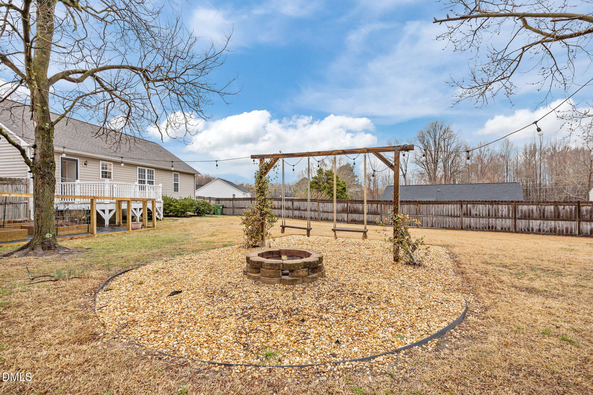 71 Rosa Circle Willow Spring, NC 27592 - Photo 26 of 31 a swimming pool with outdoor seating and yard