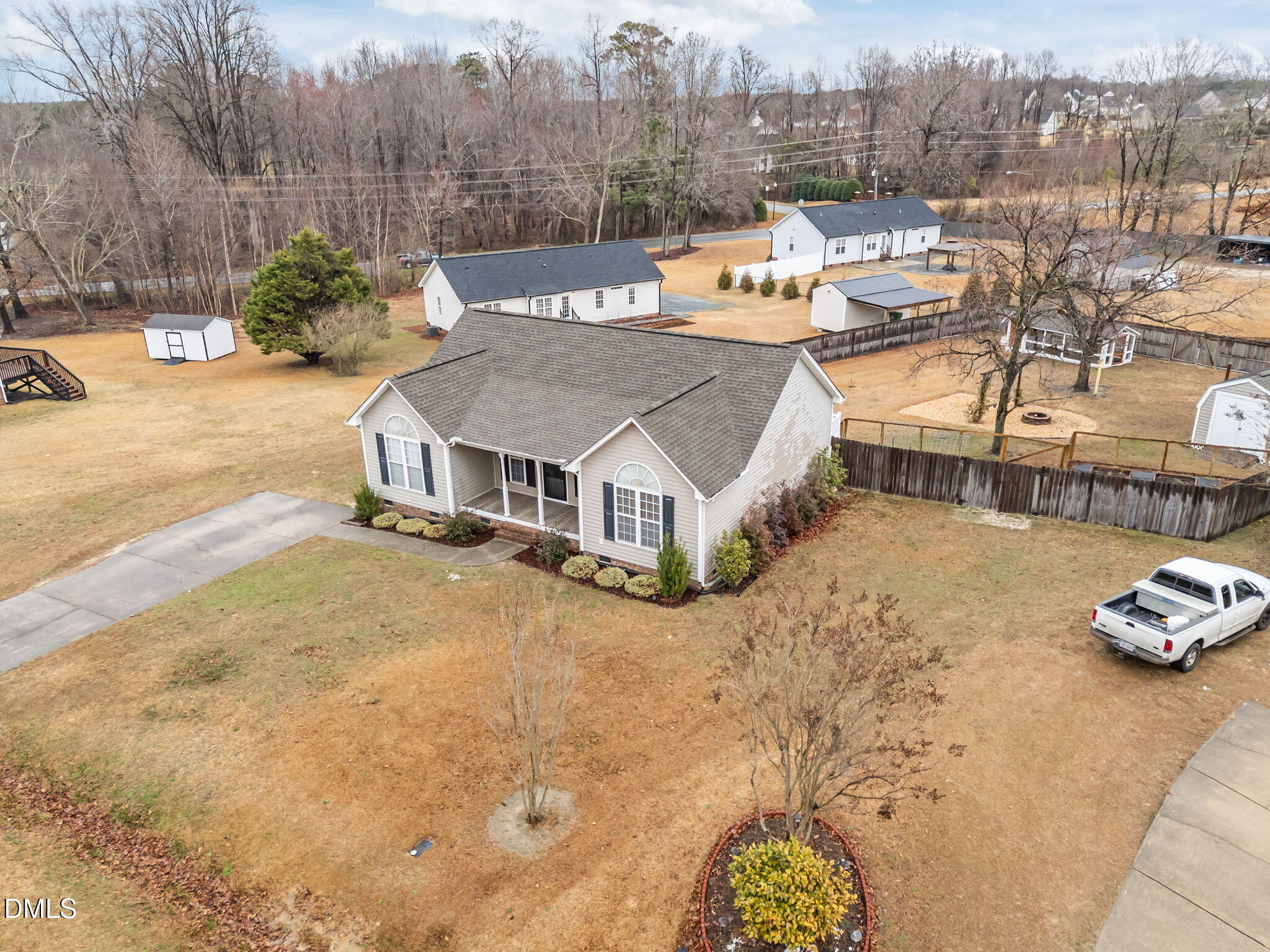 71 Rosa Circle Willow Spring, NC 27592 - Photo 29 of 31 a view of a house with a yard covered in snow