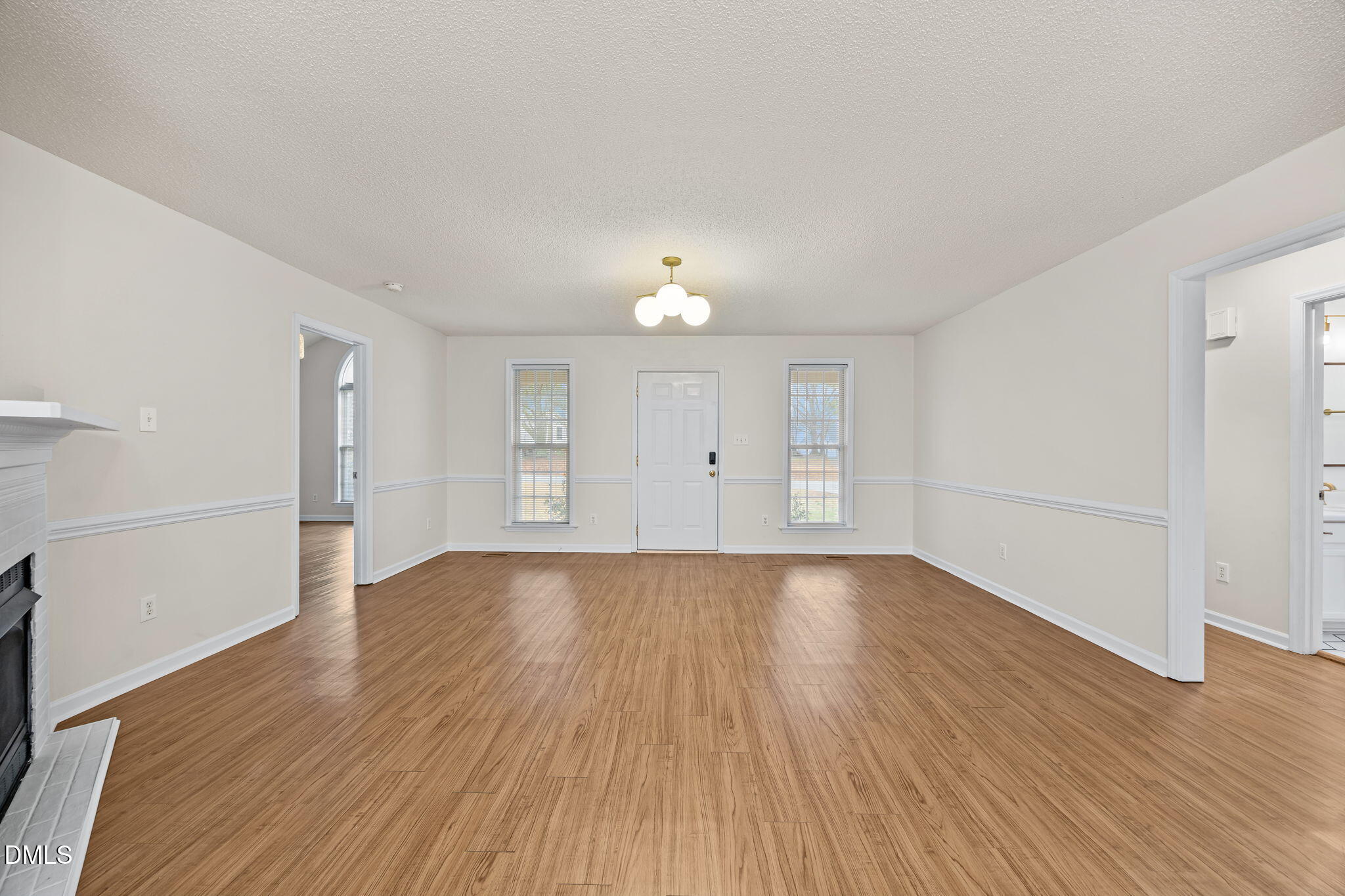 71 Rosa Circle Willow Spring, NC 27592 - Photo 5 of 31 a view of an empty room and wooden floor