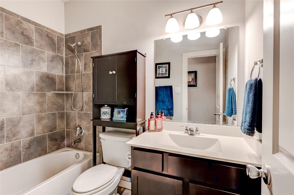 231 Windswept Way Kyle, TX 78640 - Photo 21 of 33 a bathroom with a sink toilet and shower