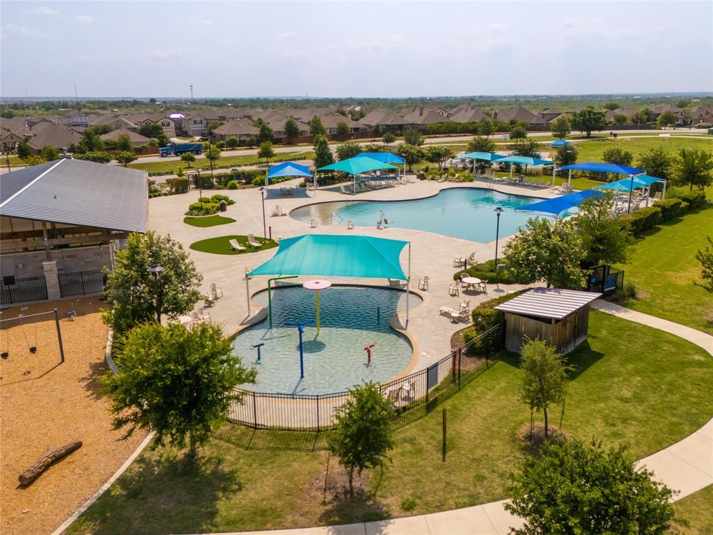 231 Windswept Way Kyle, TX 78640 - Photo 34 of 39 an aerial view of residential houses with outdoor space
